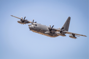 C-130 plane flying.