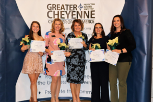 Women of Cheyenne holding awards.