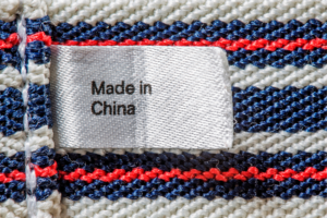 Piece of clothing with a tag that reads, "Made in China".