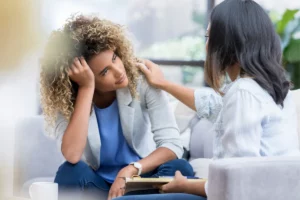 Woman talking to her doctor.