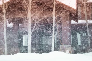 House surrounded by snow.