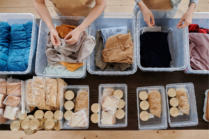 People sorting donations into boxes.