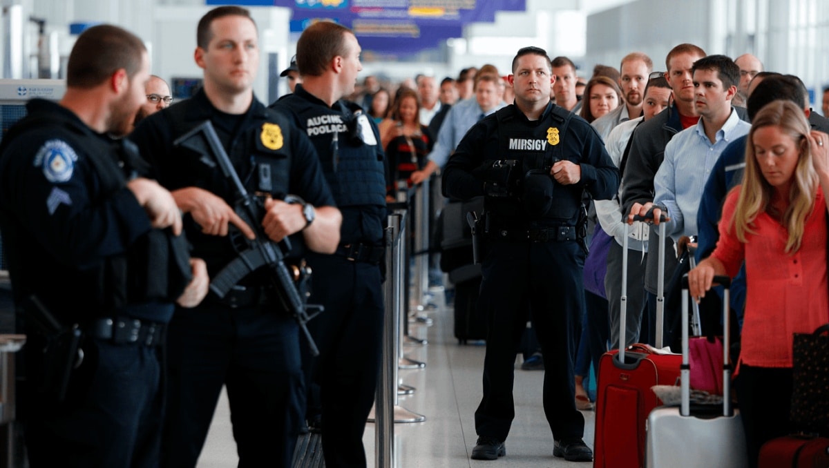ICE officers go to TSA checkpoints at Trump’s direction, while long wait times at airports persist