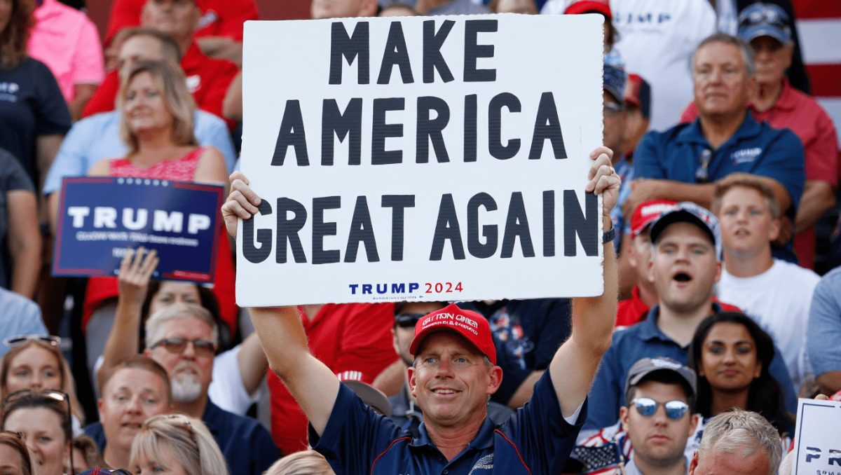 Can the man behind a giant pro-Trump sign ride the president’s praise to Congress?