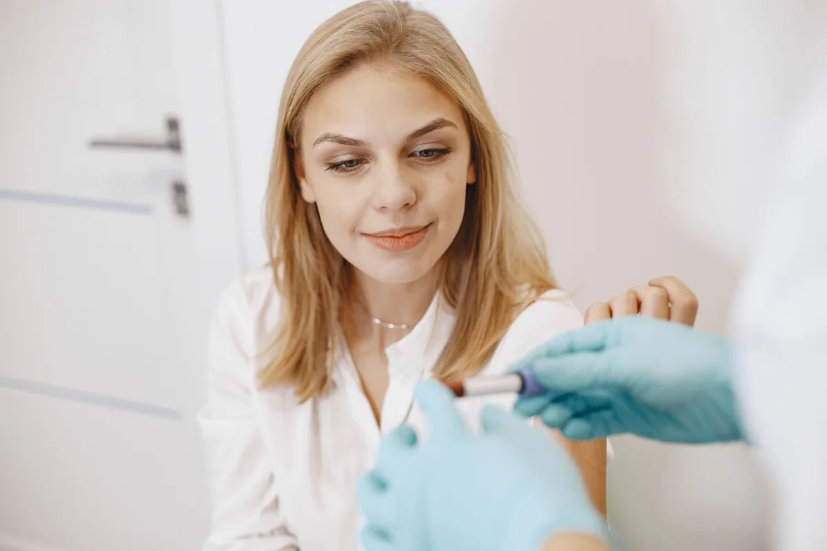 Cholesterol blood test results on a clinical document with stethoscope