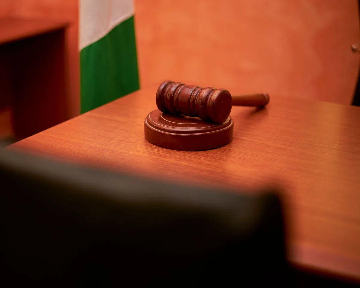 Courtroom interior showing judge's bench and legal proceedings