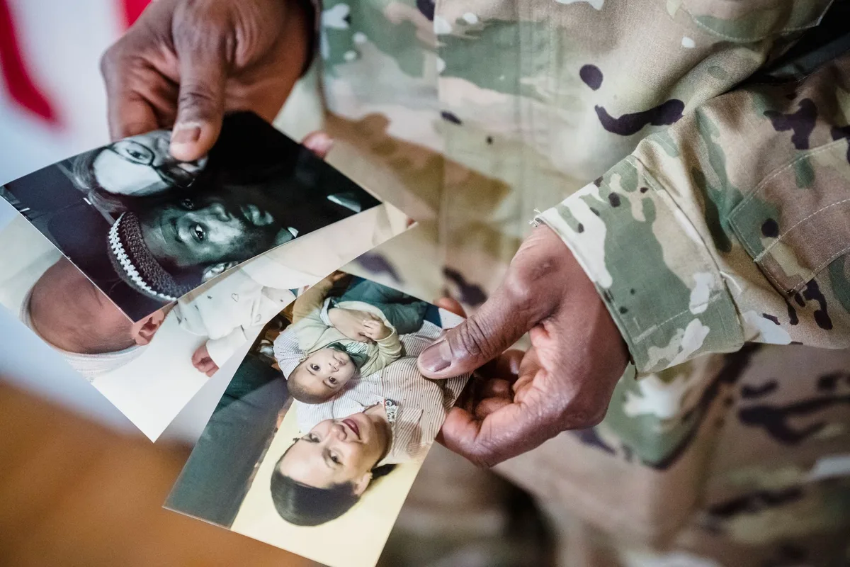 Uniformed service member managing childcare and family responsibilities at home