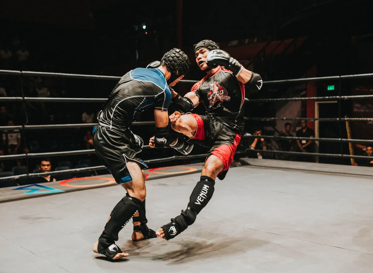 MMA fighter in striking stance demonstrating power and technique