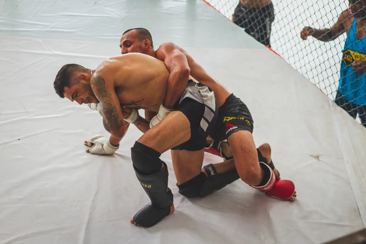 Fighter celebrating after a decisive knockout victory