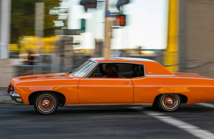 Vehicle accelerating on street with blurred background