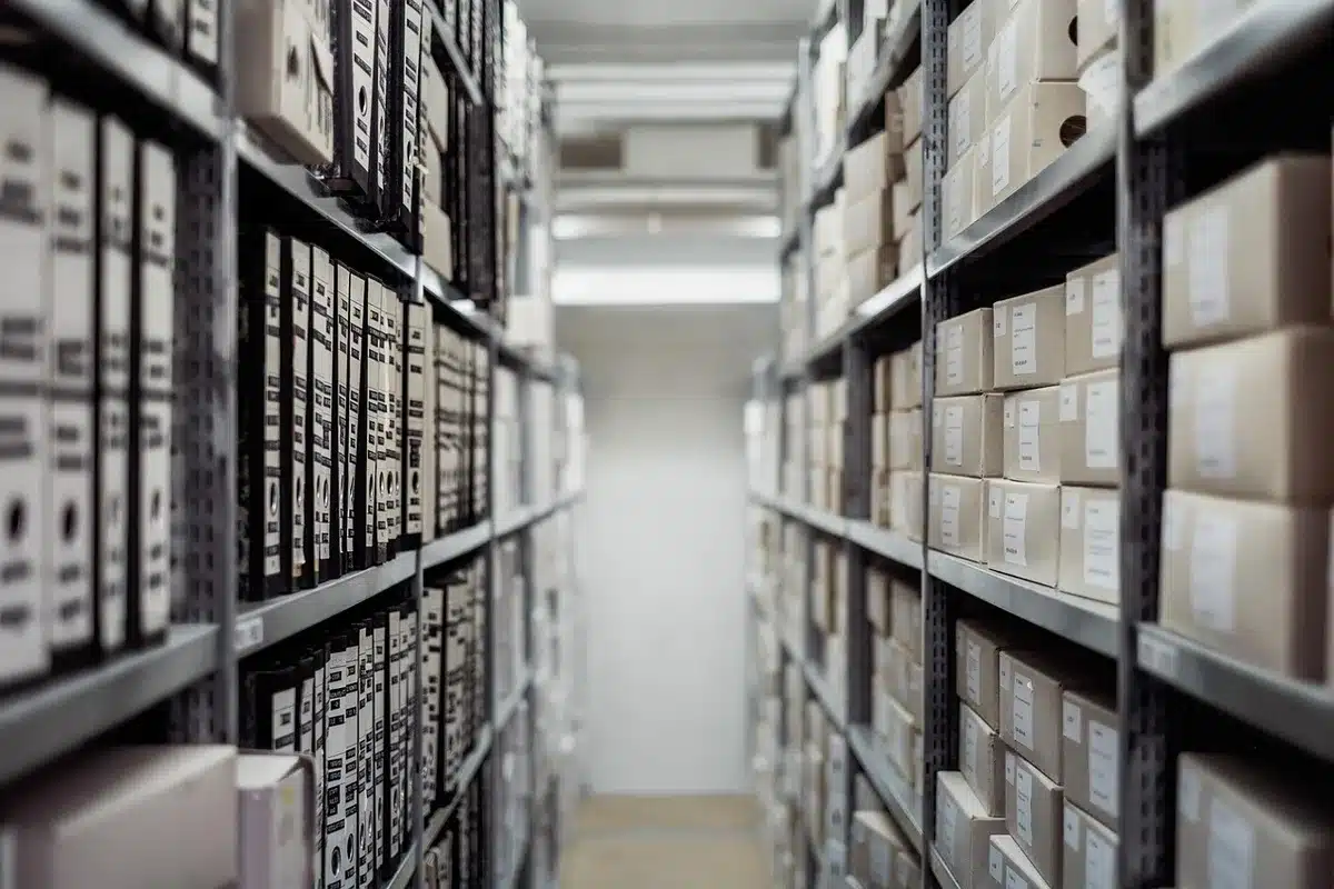 Redacted documents and a file folder to illustrate confidential business information