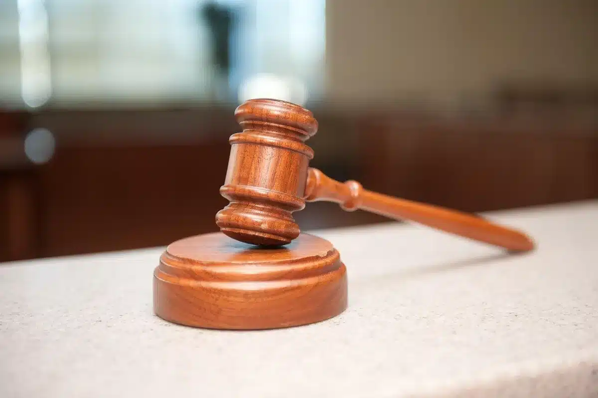 Judge's gavel in a courtroom during a ruling on financial penalties and disgorgement