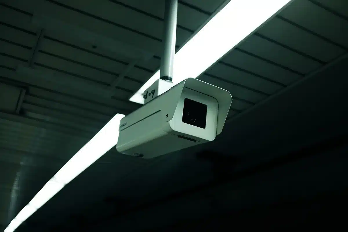 Security camera recording footage inside a rental car facility