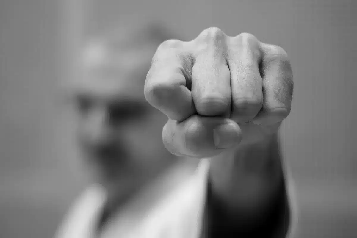 Fighter maintaining striking range while opponent closes distance
