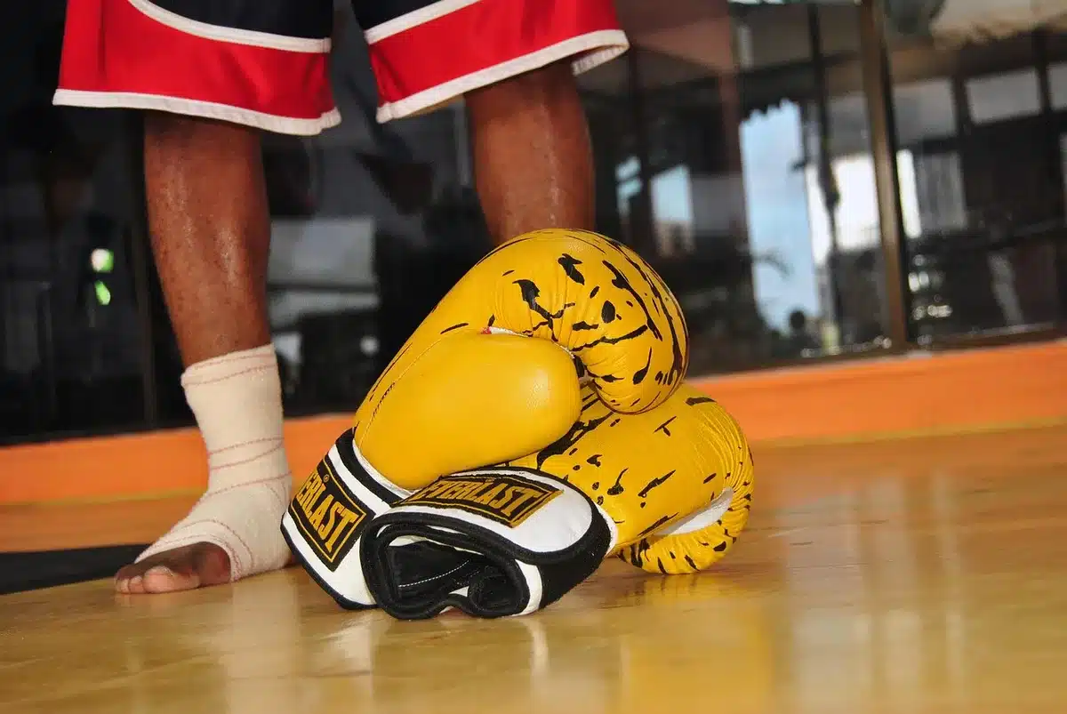 Veteran fighter in a gym sparring and preparing for a five-round pace
